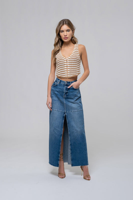 Girl wearing white and tan striped crop top