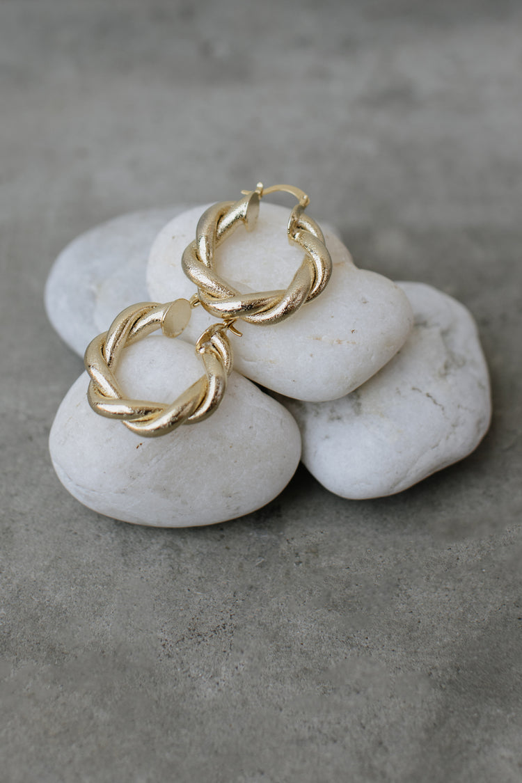 Cute gold twisted hoops