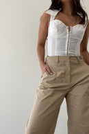 Girl wearing viral tan trousers